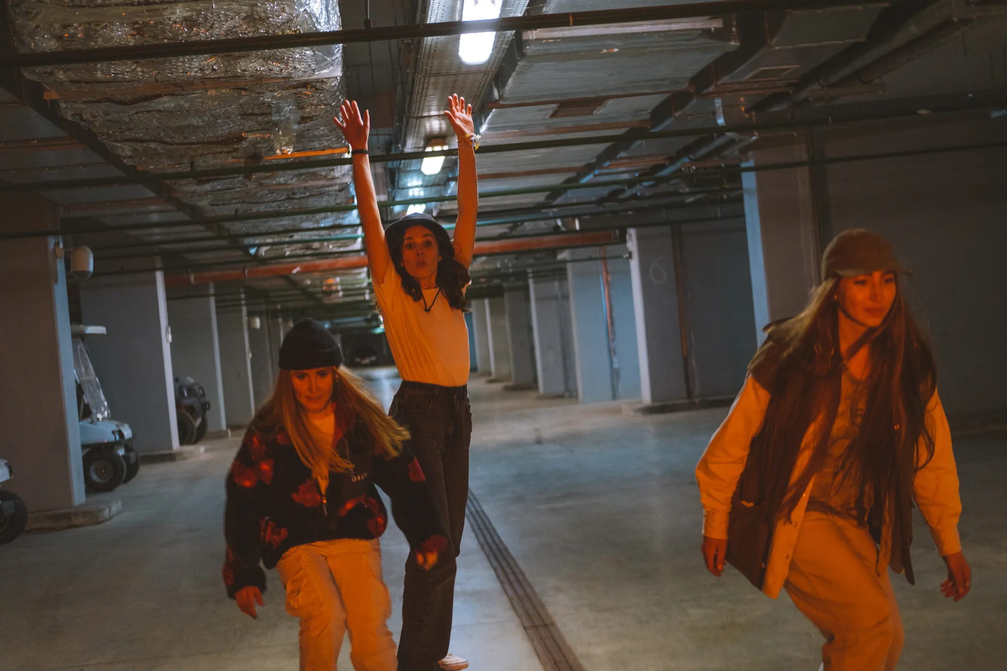 Three woman in parking garage